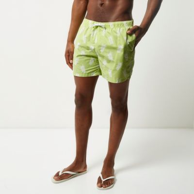 Green pineapple print swim shorts